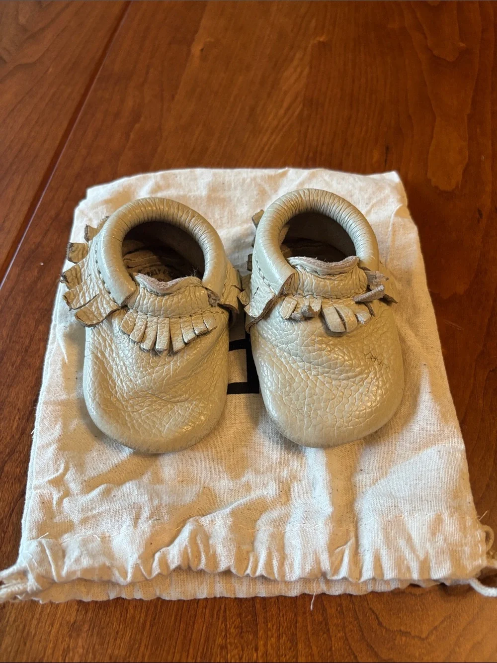 Freshly Picked Cream Leather Fringe Baby Moccasins